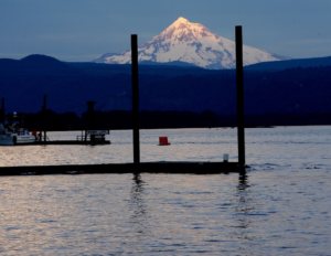 Snow capped Mount Hood peers out over the Columbia River