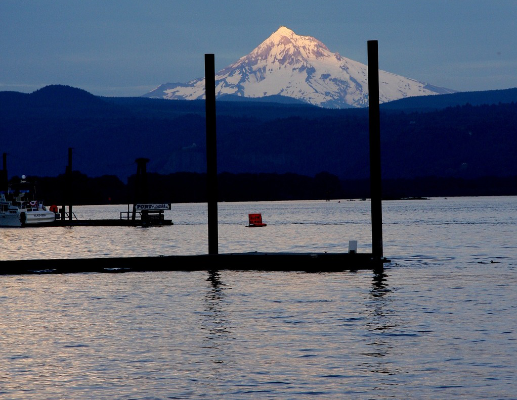 Snow capped Mount Hood peers out over the Columbia River